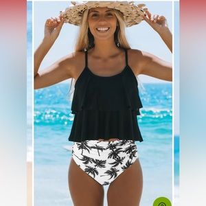 New with tags tankini swimsuit. Hish waist bottoms. Size XL.  Smoke free home.